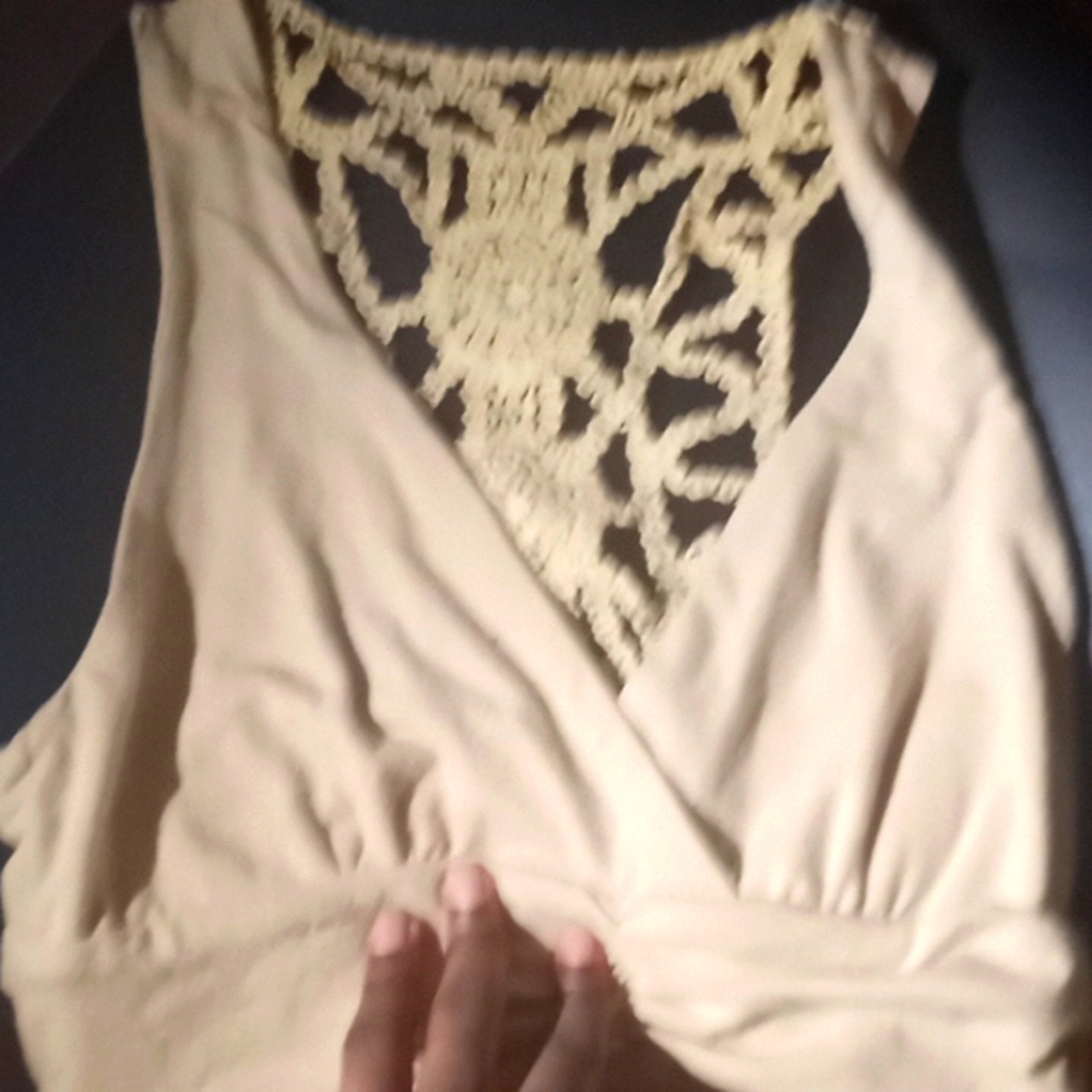 short Dress that is a light brown also has a rip that can be sew back togethe❤